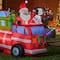 Glitzhome® 7ft. Inflatable Santa in Truck With Lights